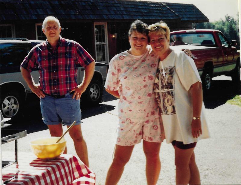 The Moms with dad looking on