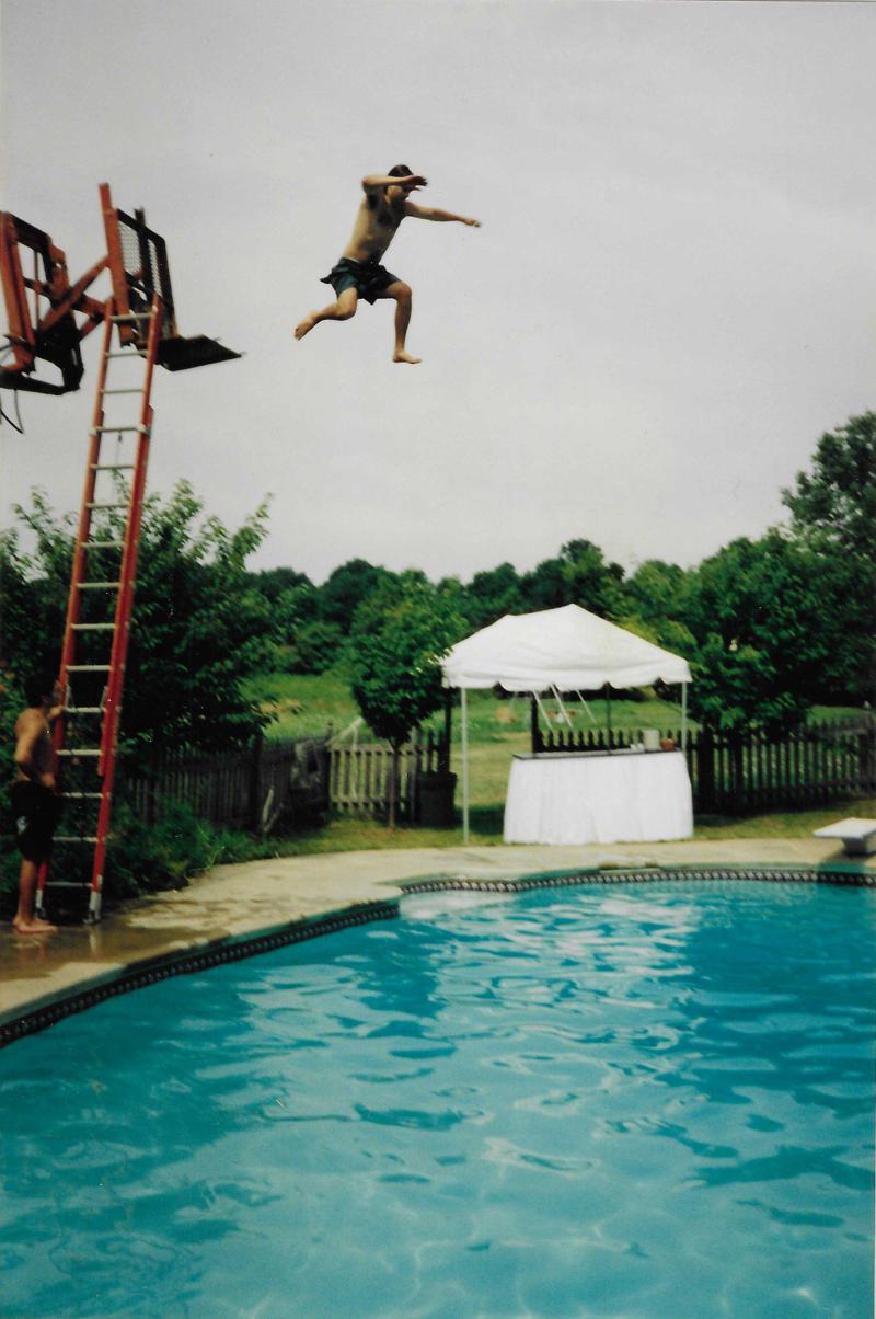 Jumping off the Lull a huge forklift into the pool